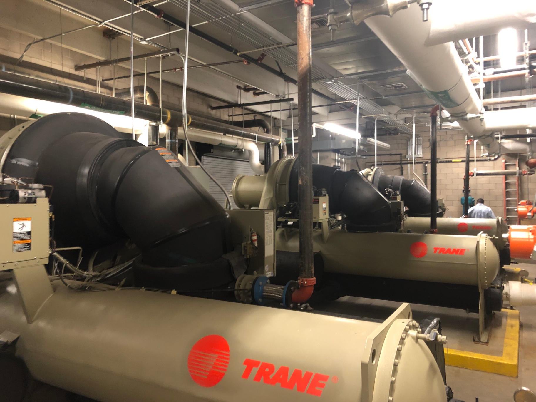 Two Trane water-cooled centrifugal chillers in a plant mechanical room