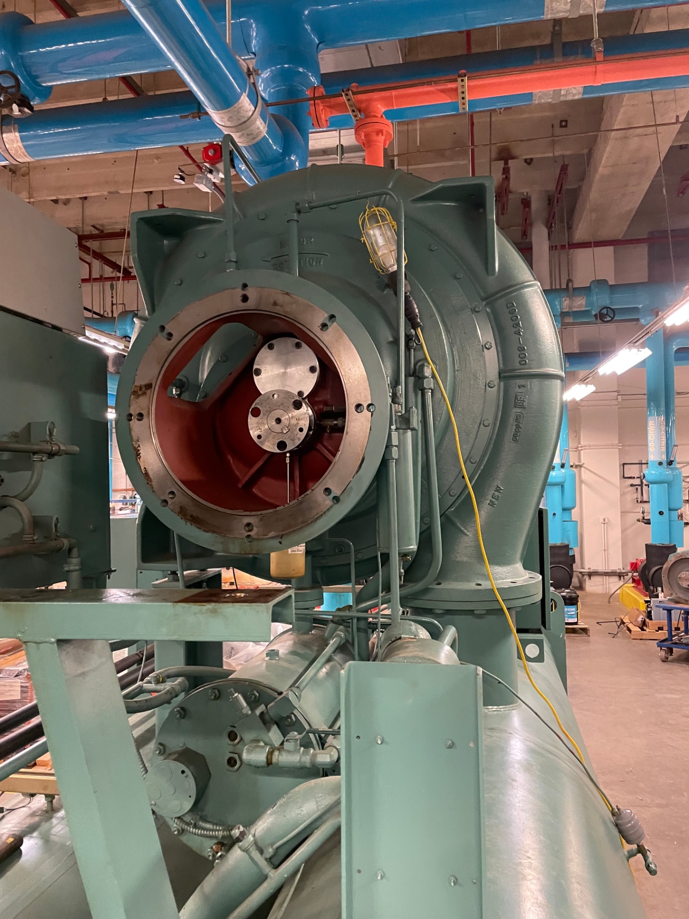 York chiller volute opened for inspection in a mechanical room